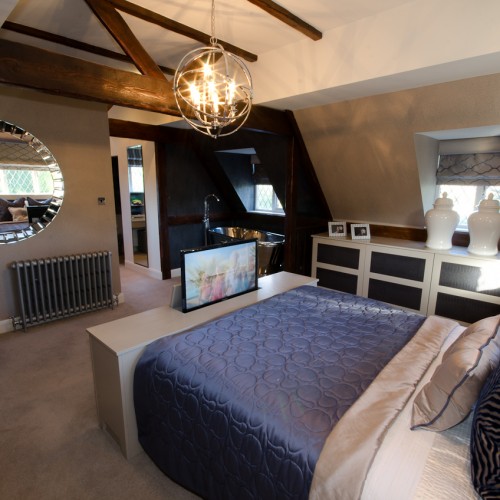 Modern classic bedroom design with tub bath and pop up TV