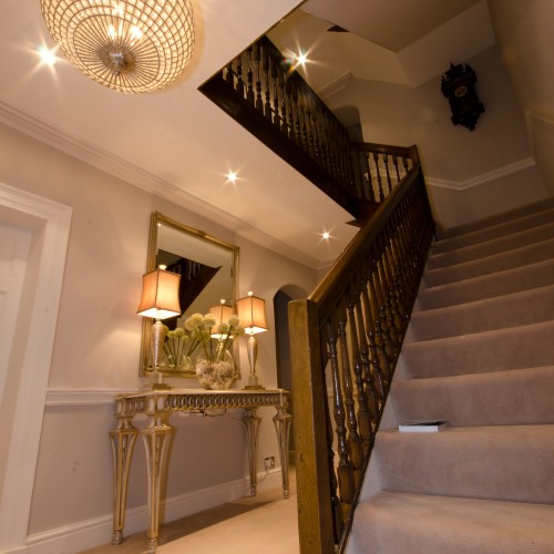 Hall and stairs interior design with Console Table and accessories