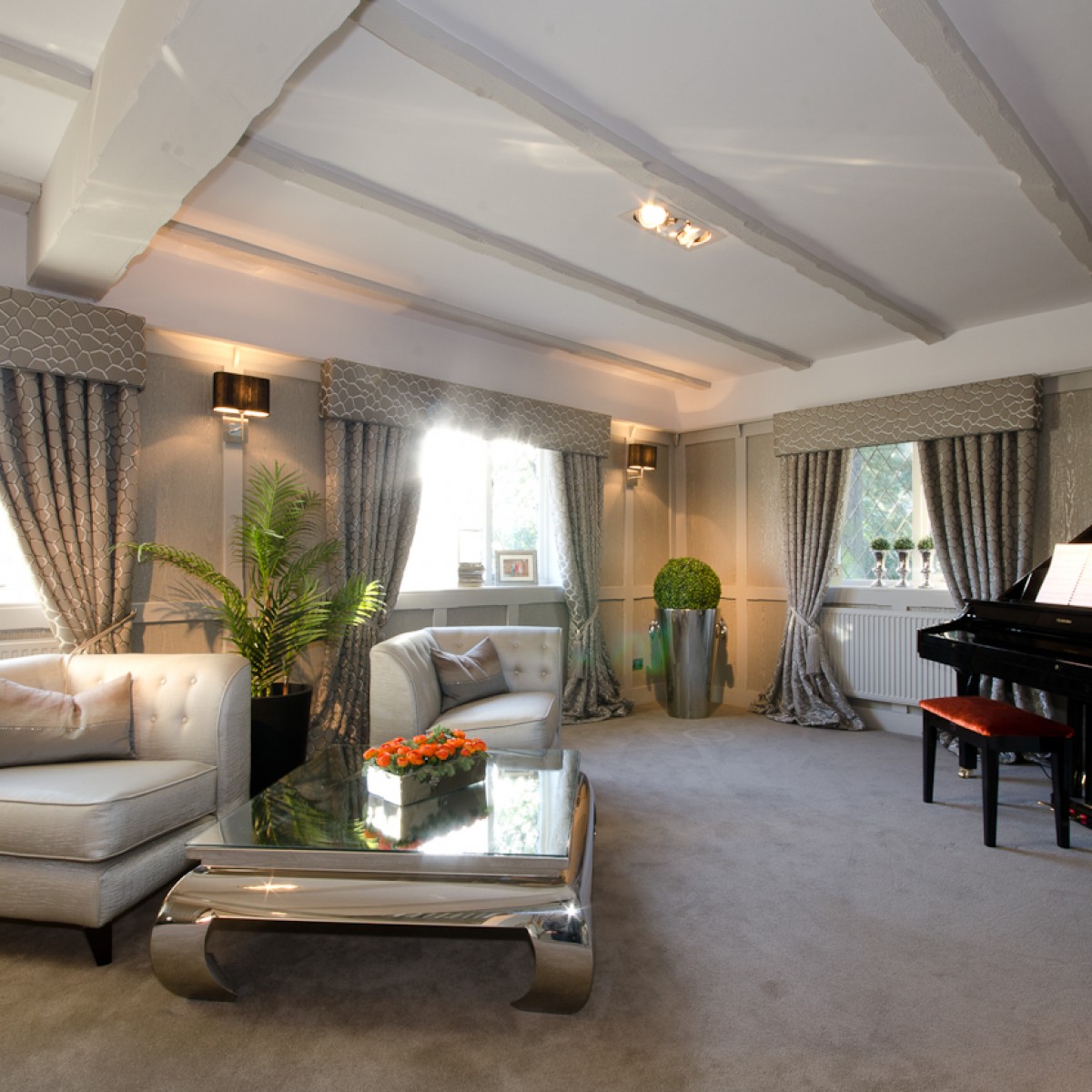 Entrance hallway with grand piano and bespoke interior design furnishings
