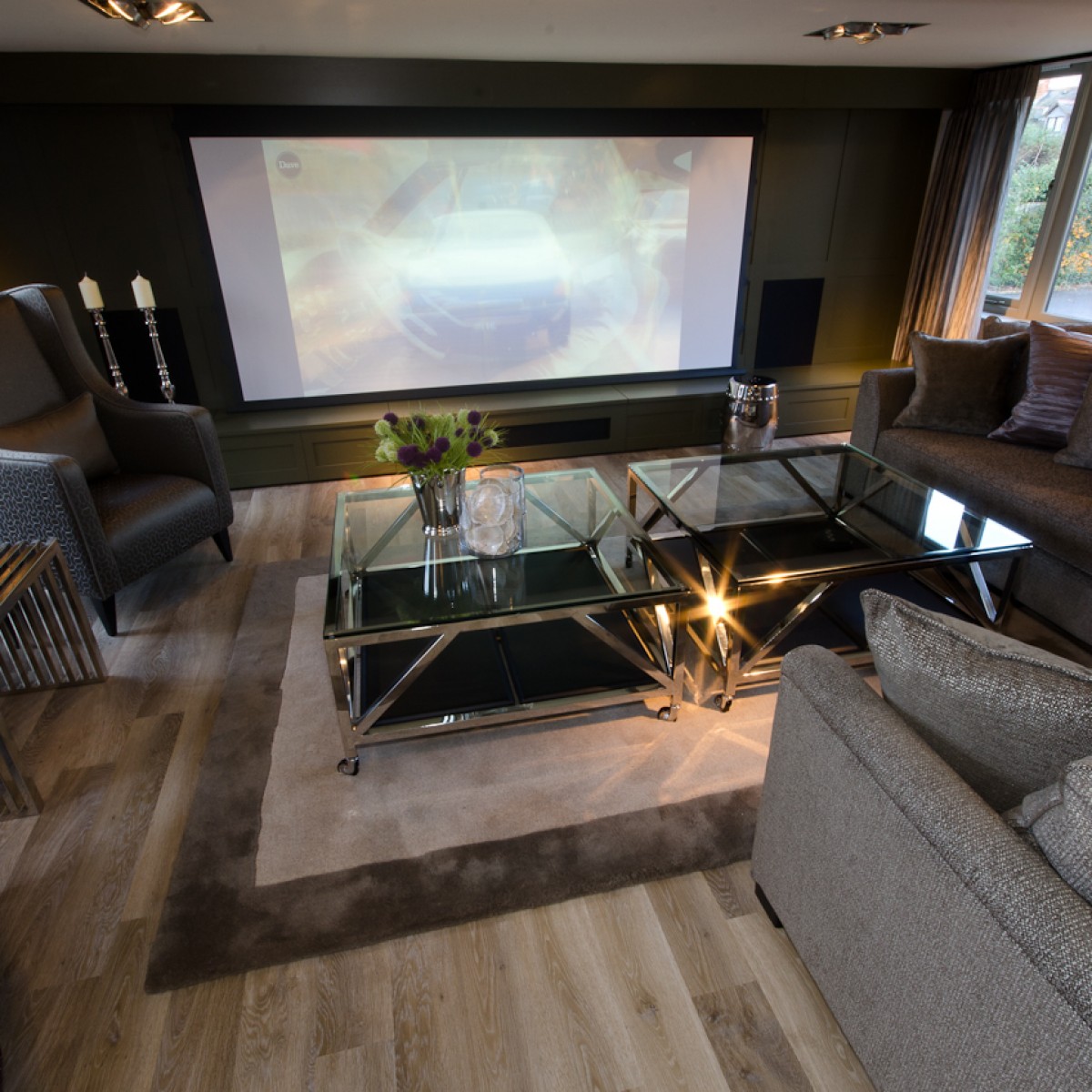 Contemporary living room with cinema screen
