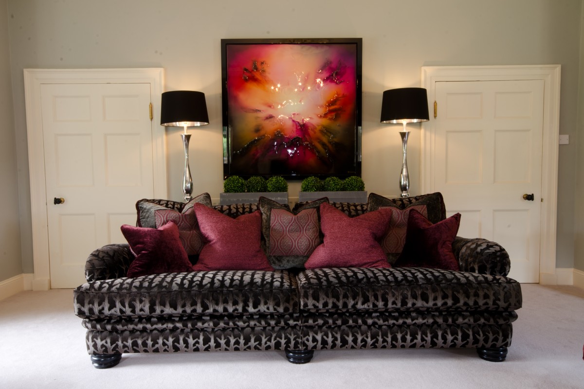 Mink velvet sofa with deep red furnishings from traditional home design